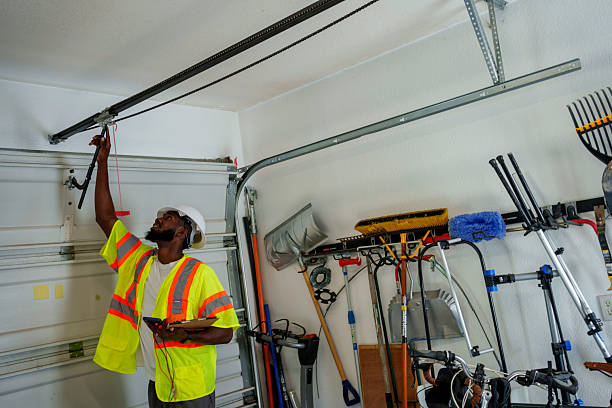 Professional Garage Door Roller Replacement technician working in Oakdale, NY